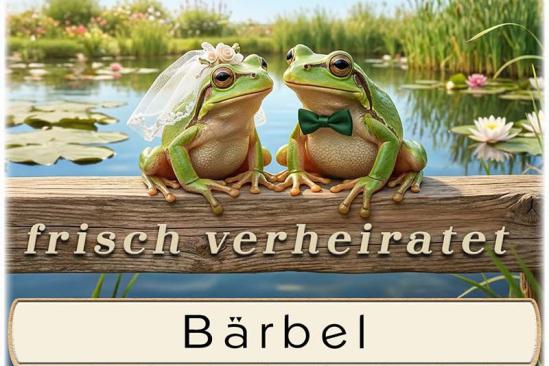 Die Tischkarte zur Hochzeitsfeier – das lustige Froschpaar – mit eingedrucktem Namen des Gastes